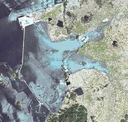 Satellite image of the 34 km seawall enclosing a fresh water lake of approximately 400 sq.km.