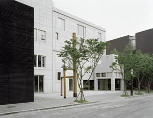 Looking towards the Art Yard and Entrance Portico of the YouHwaDang Book Hall building from the Bookmaker’s Street in Paju Book City. Photo: Jonathan Lovekin, June 2009.