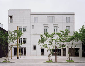 YouHwaDang Book Hall, front façade facing the Art Yard. The façade has a delicate in-situ cast concrete relief, like a drawing, giving the building a  sense of civility. Photo: Jonathan Lovekin, June 2009.